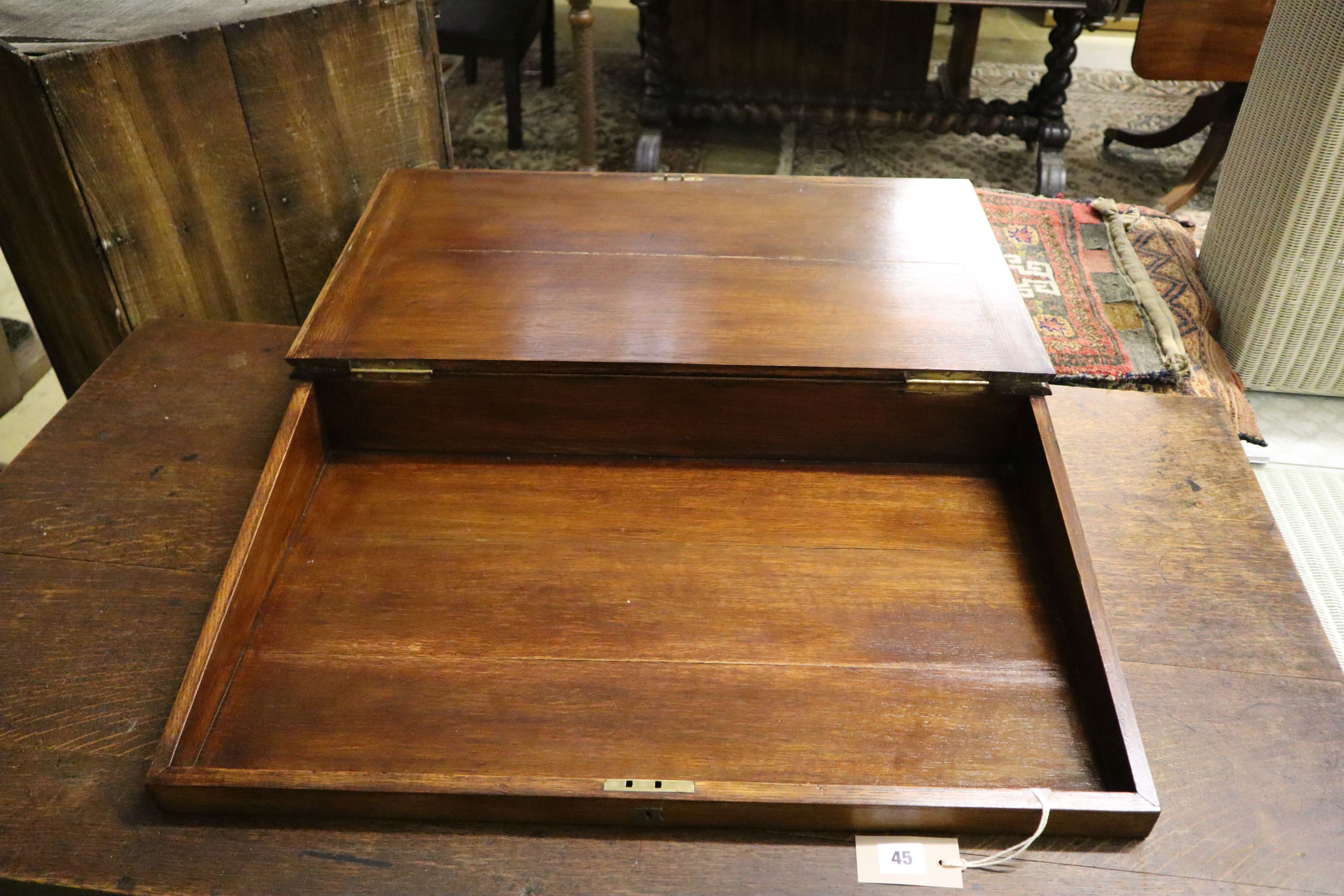 A late Victorian oak and mahogany writing slope, width 70cm, depth 54cm